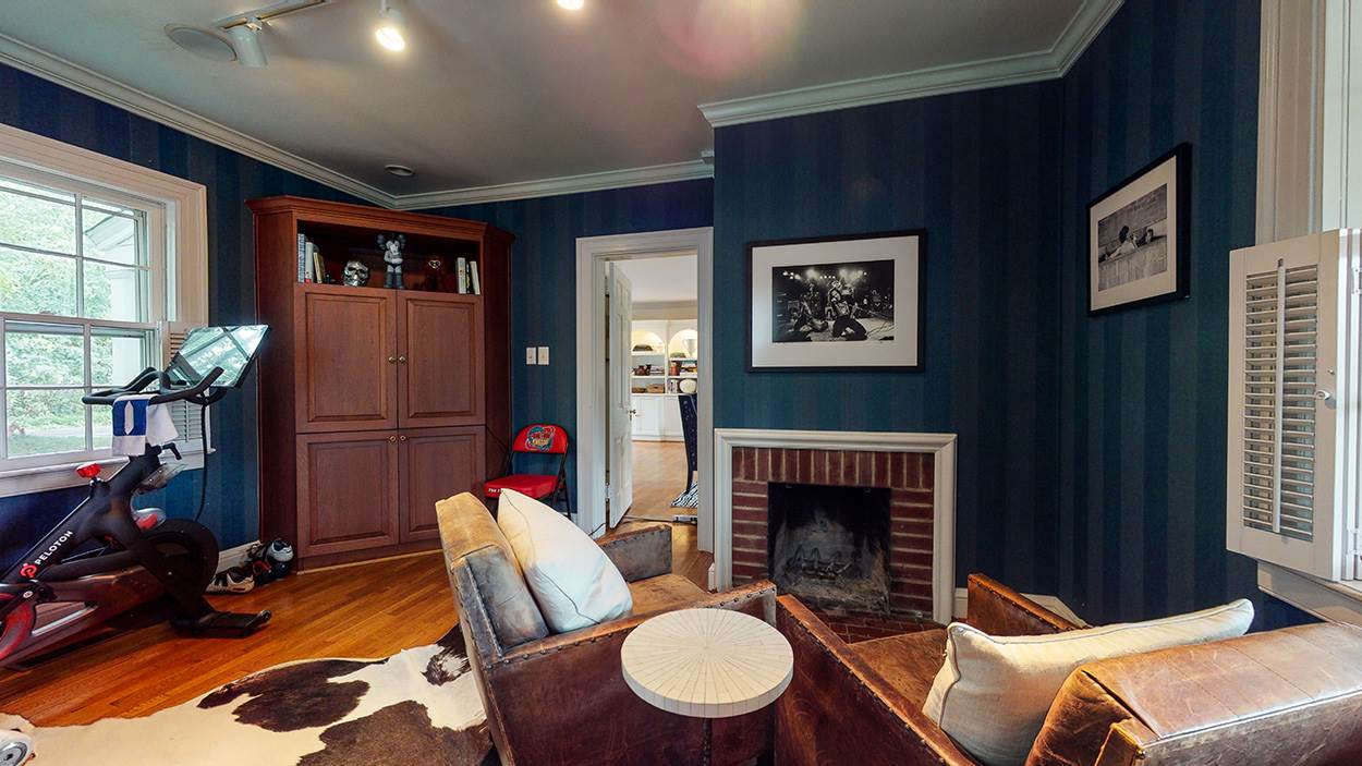 3816 Dover Road Durham, NC 27707 - Photo 9 of 30 a living room with furniture a fireplace and next to windows
