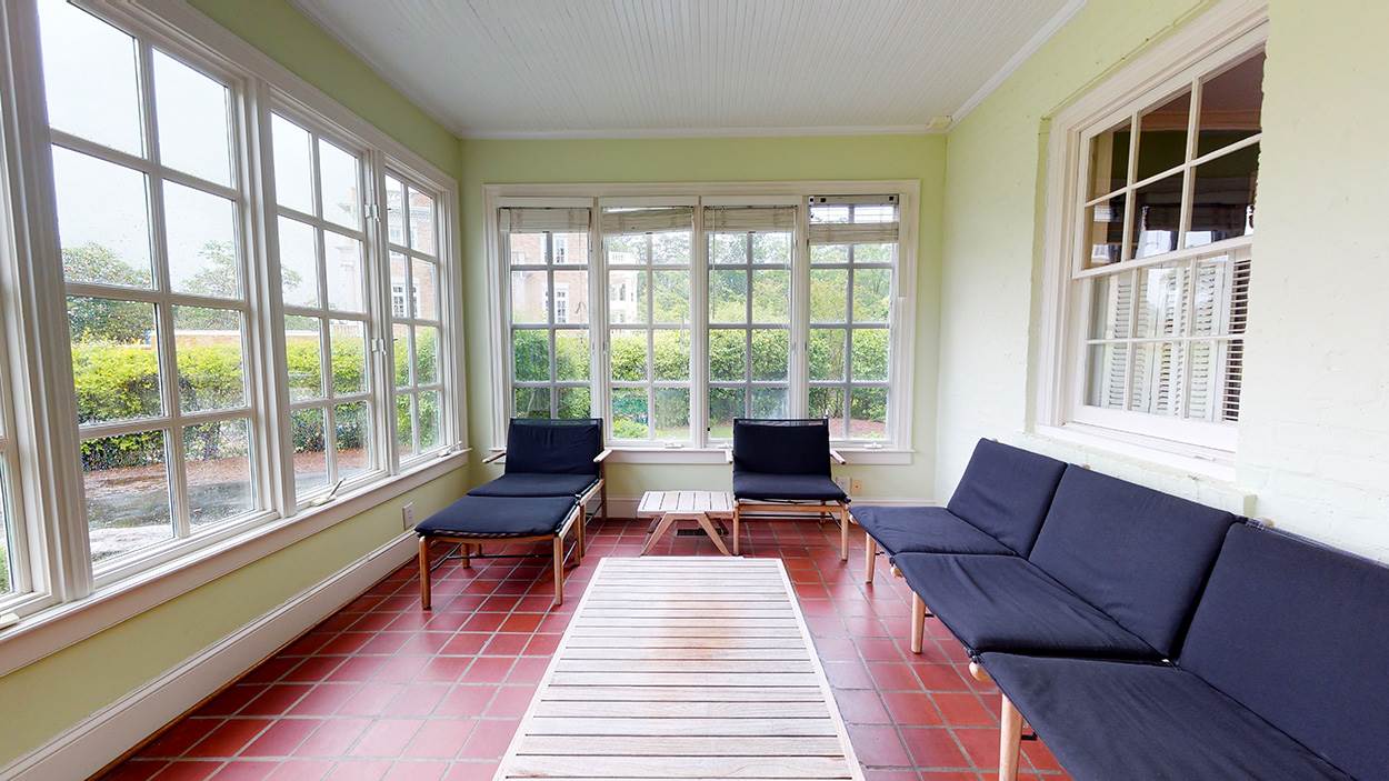 3816 Dover Road Durham, NC 27707 - Photo 10 of 30 a living room with furniture and a large window
