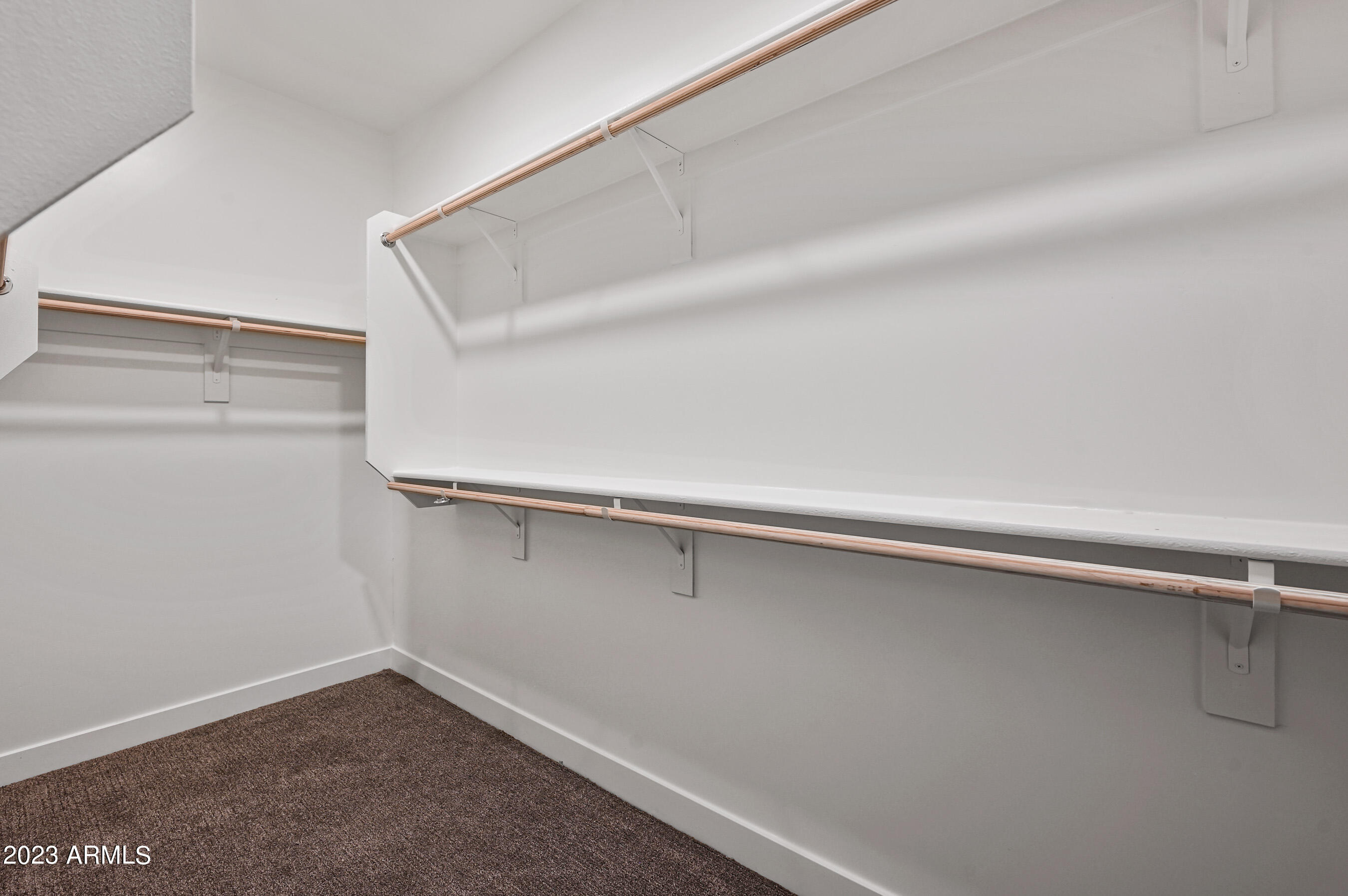 1023 West 5th Street, Unit 1006 Tempe, AZ 85281 - Photo 18 of 35 a close up view of racks on the wall