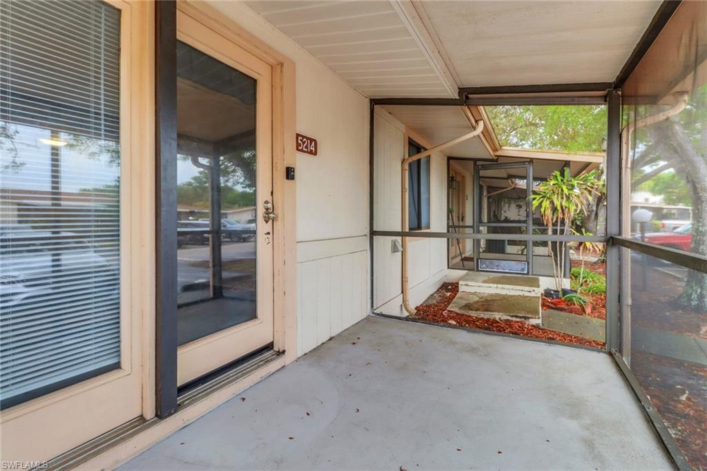5214 Treetops Drive, Unit I Naples, FL 34113 - Photo 2 of 18 a view of storage and utility room