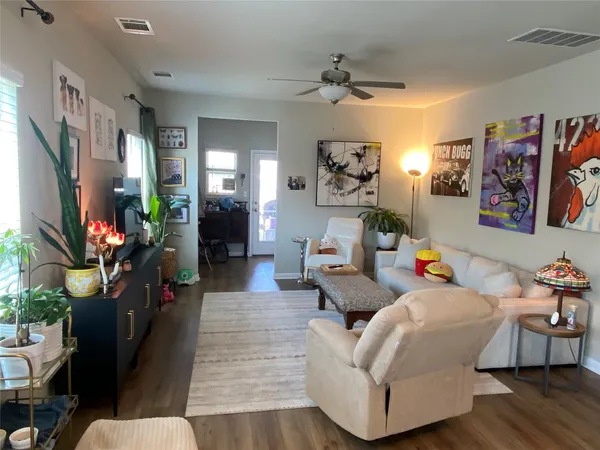 a living room with furniture and a couch