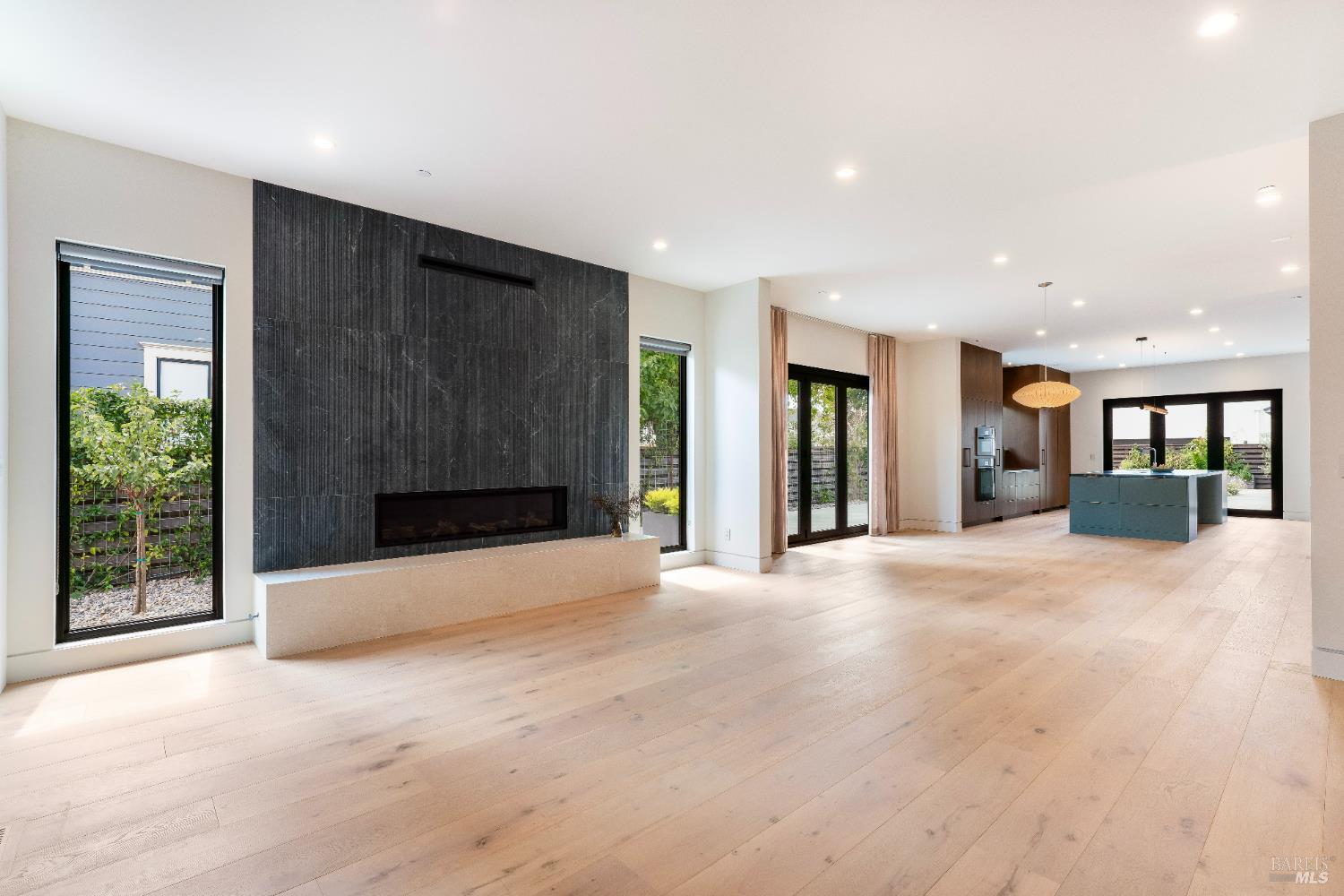 983 Grove Street Healdsburg, CA 95448 - Photo 4 of 52 a view of an empty room with large windows