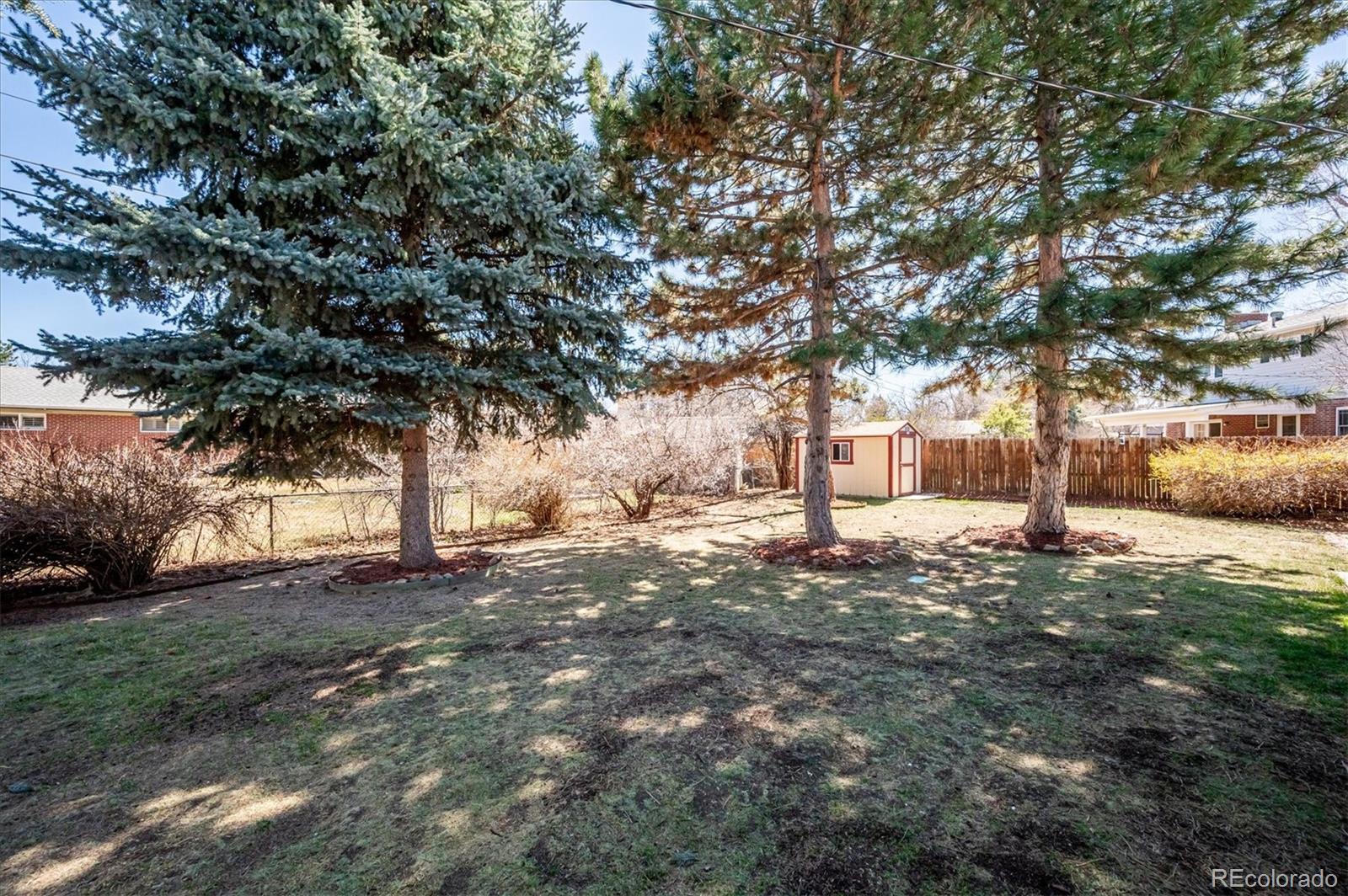 6640 South Williams Circle West Centennial, CO 80121 - Photo 19 of 23 a view of road with trees