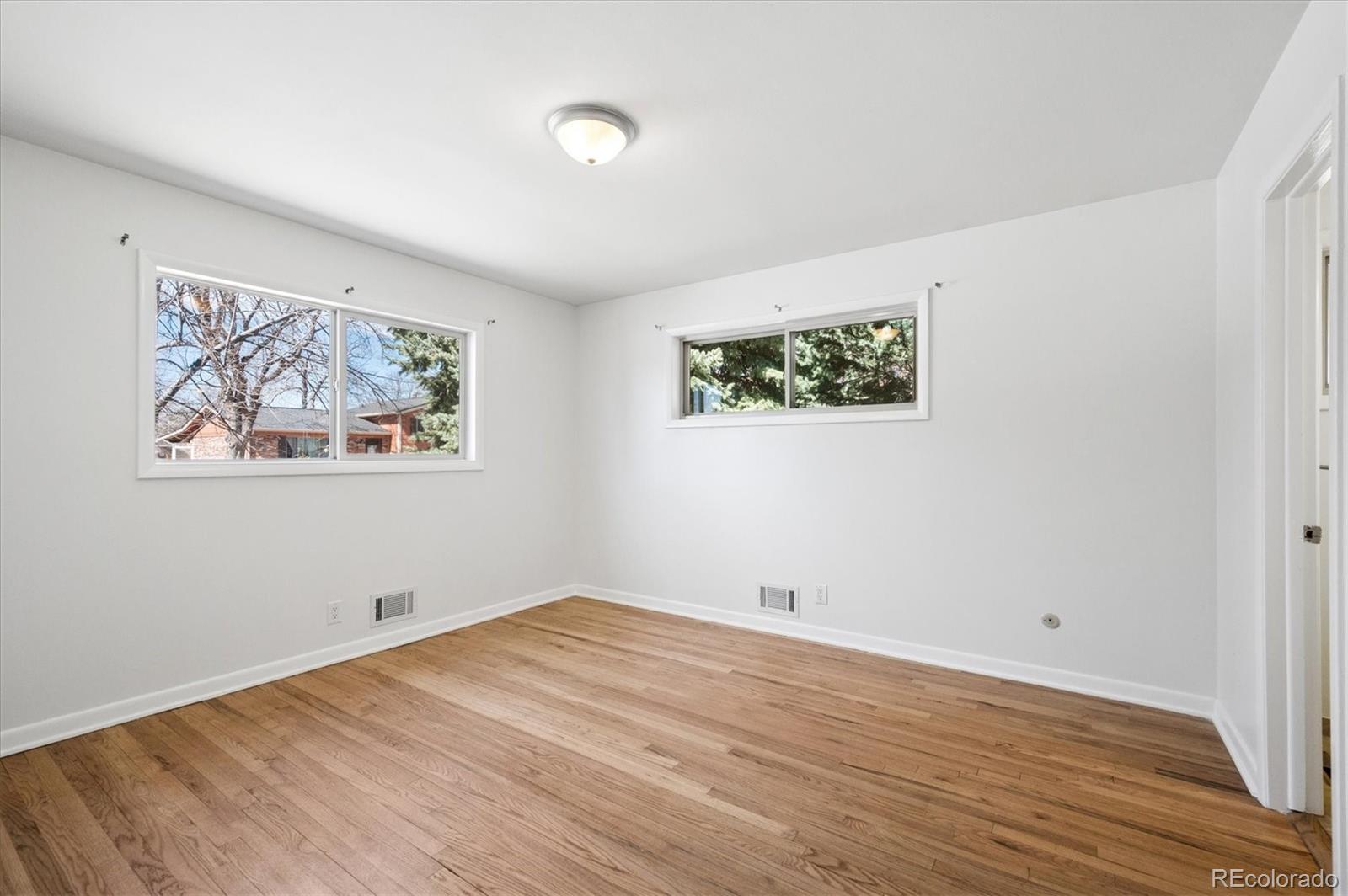 6640 South Williams Circle West Centennial, CO 80121 - Photo 9 of 23 a view of room with wooden floor and window