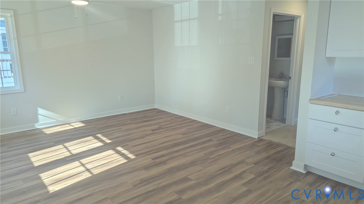 3008 Plumtree Street Colonial Heights, VA 23834 - Photo 3 of 11 Unfurnished room with dark wood-style floors and a