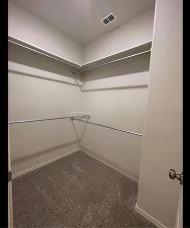 a view of a room with an empty space