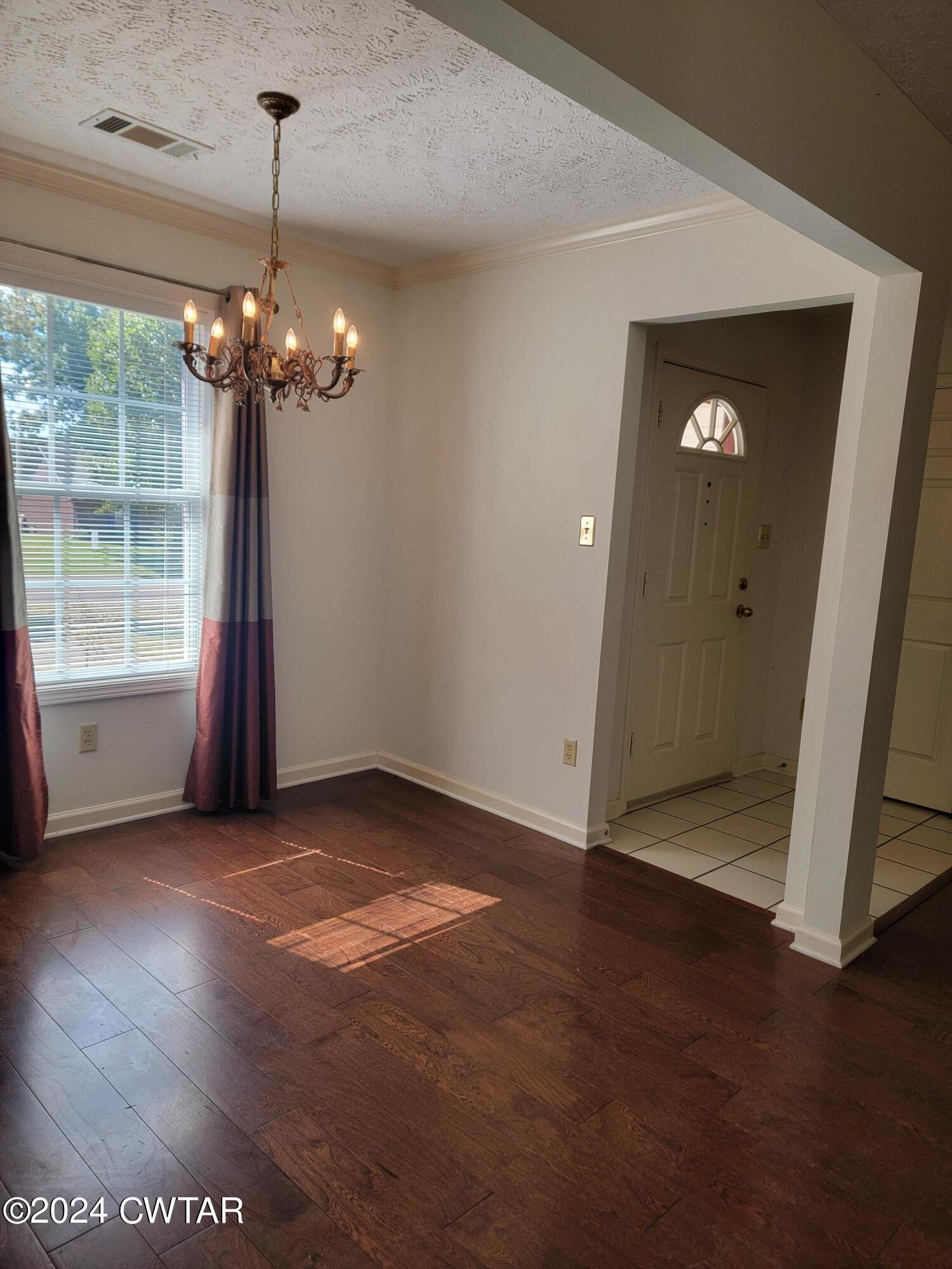 604 Gettysburg Drive Jackson, TN 38305 - Photo 7 of 22 a view of an empty room with a window