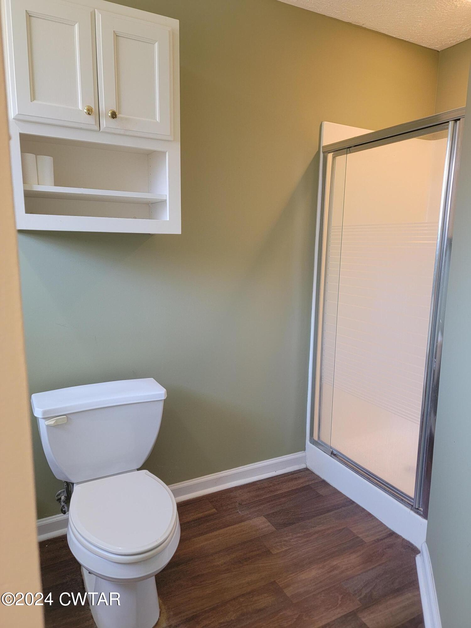 604 Gettysburg Drive Jackson, TN 38305 - Photo 10 of 22 a bathroom with a toilet