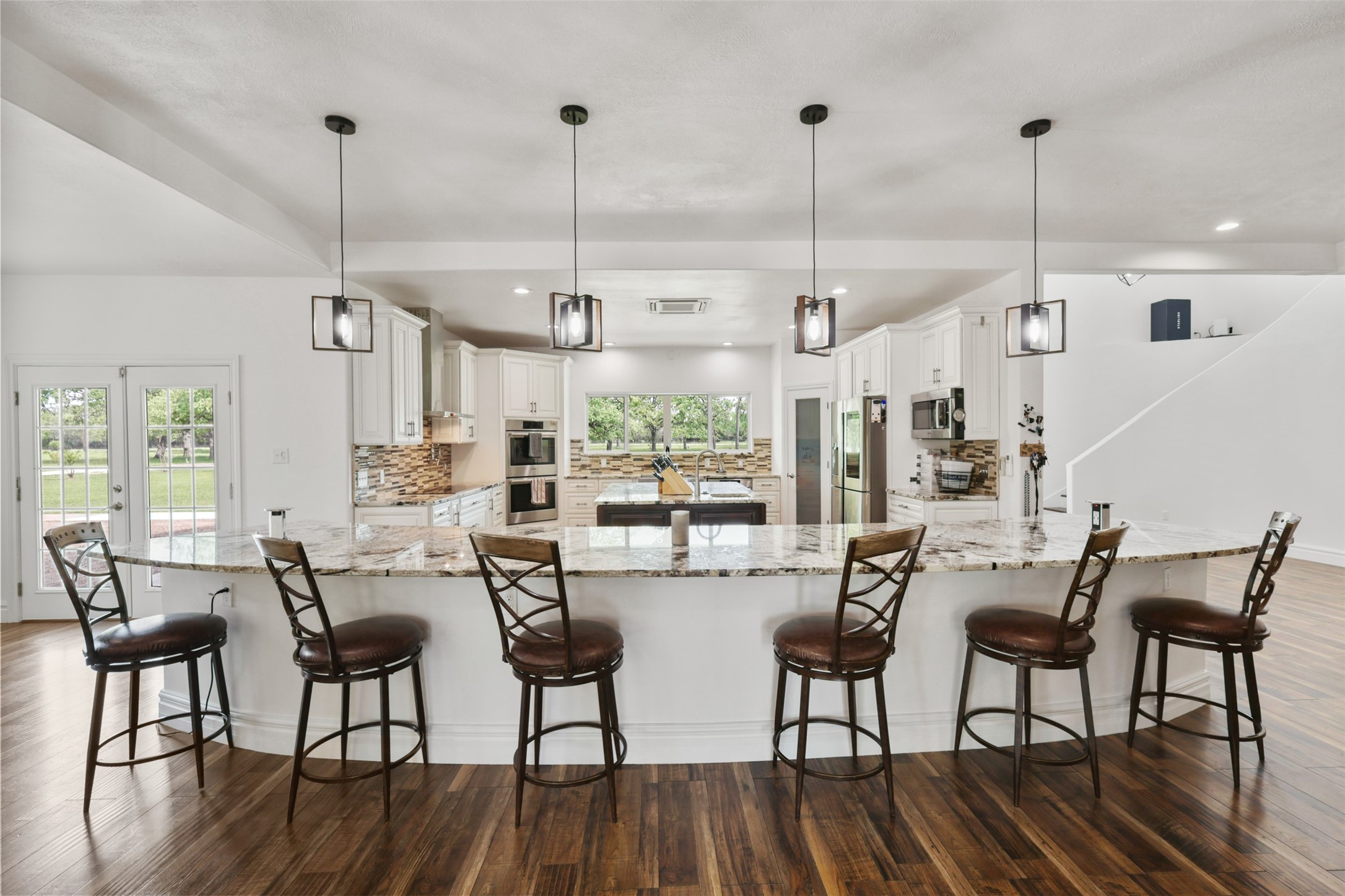 43919 Austin Branch Road Hempstead, TX 77445 - Photo 16 of 48 Chef’s dream kitchen with high-end finishes! Featuring a massive custom granite island (3cm granite throughout).