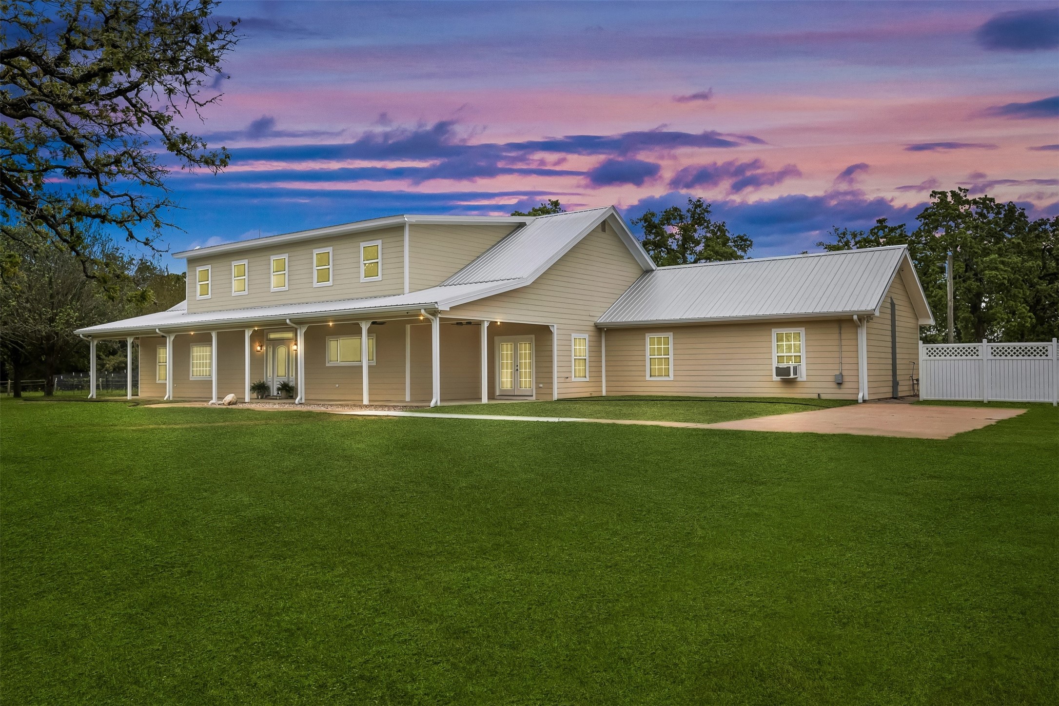 43919 Austin Branch Road Hempstead, TX 77445 - Photo 3 of 48 Welcome Home! This beautiful photo captures the charm of the custom farmhouse nestled on 9.54 serene acres. A picture-perfect welcome to your luxury country escape.