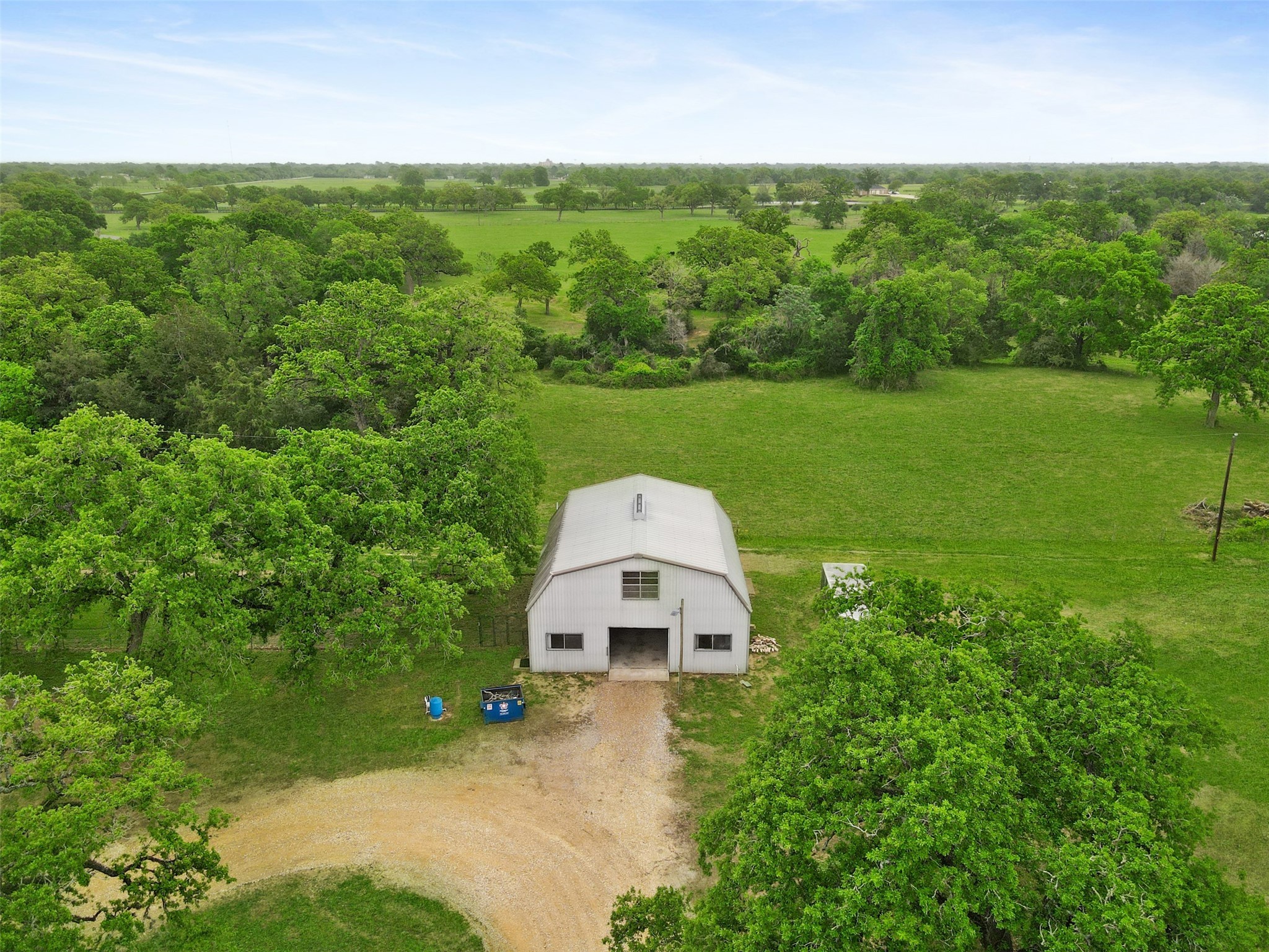 43919 Austin Branch Road Hempstead, TX 77445 - Photo 39 of 48 Large workshop with abundant space for tools, toys, and hobbies.