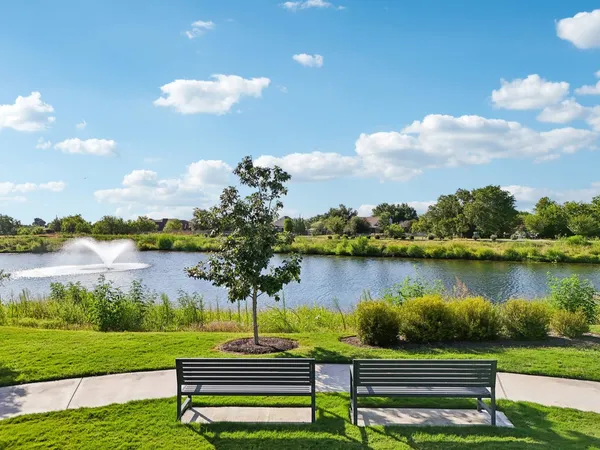 a lake view with a garden space