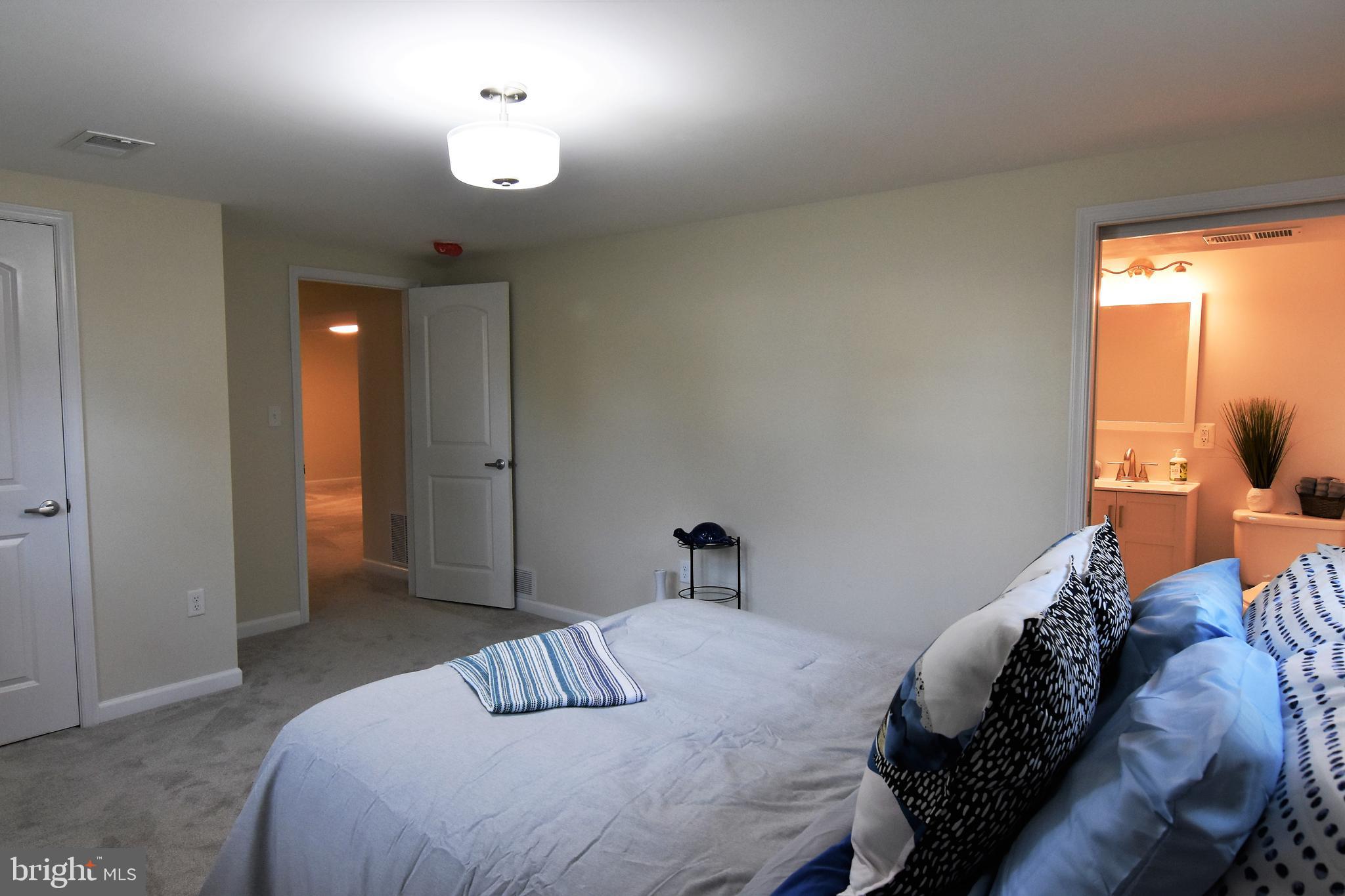 204 Dale Road Pasadena, MD 21122 - Photo 22 of 41 Master bedroom with full bath