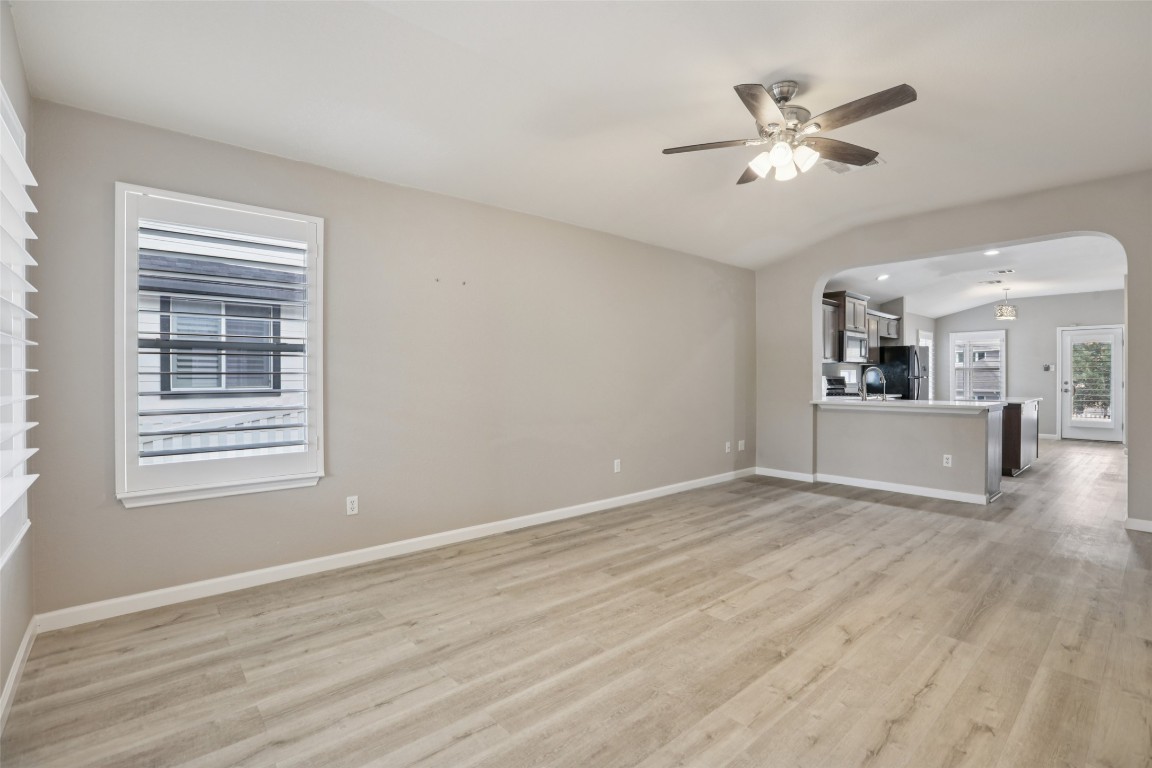 4937 Hartson Kyle, TX 78640 - Photo 10 of 40 a view of a livingroom with a furniture wooden floor and a window