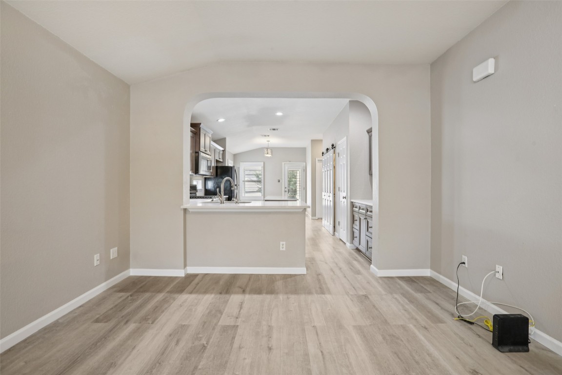 4937 Hartson Kyle, TX 78640 - Photo 12 of 40 a view of a kitchen cabinets and a wooden floor