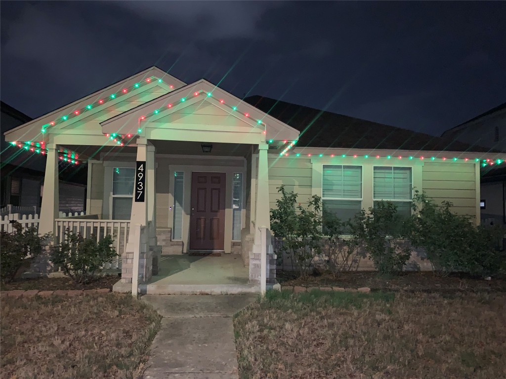 4937 Hartson Kyle, TX 78640 - Photo 39 of 40 a front view of a house with garden