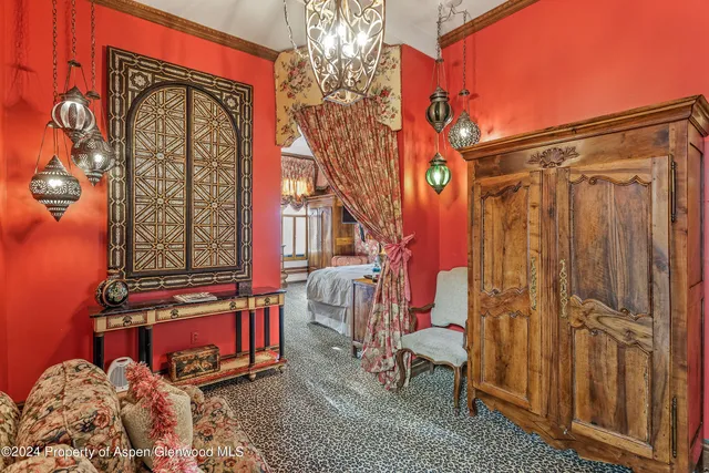 a view of a wooden door with a bench