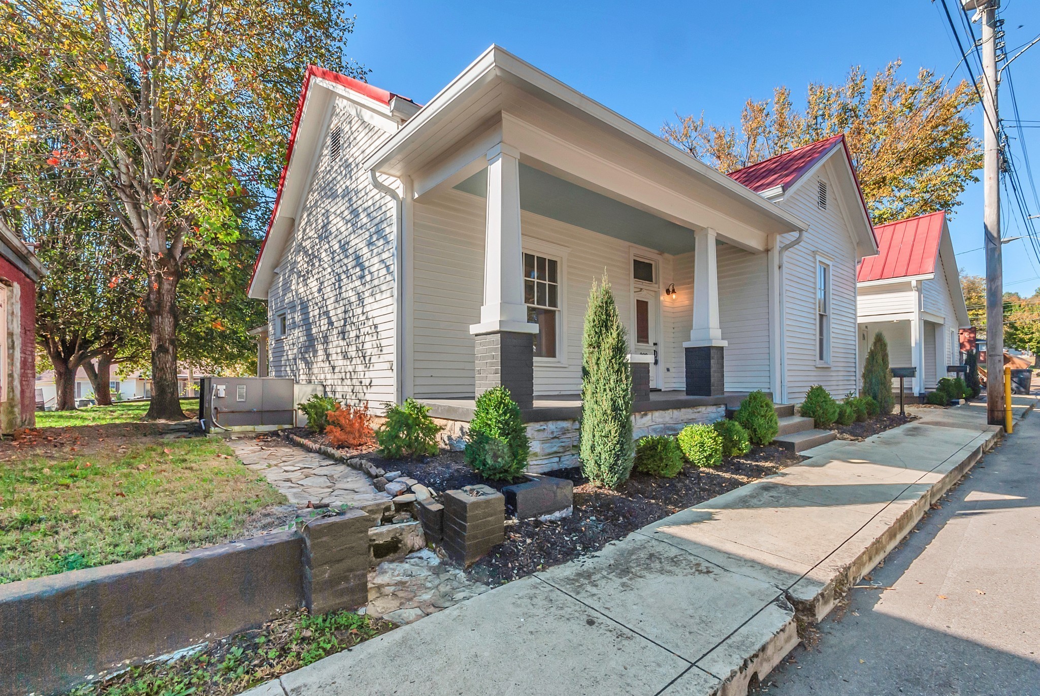 209 West 13th Street Columbia, TN 38401 - Photo 26 of 84 a front view of a house with garden