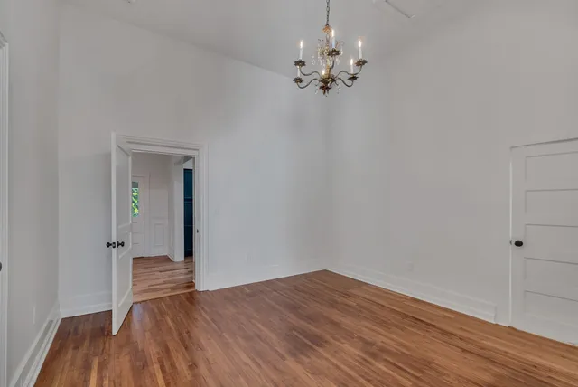 a kitchen with stainless steel appliances a stove a refrigerator and a window