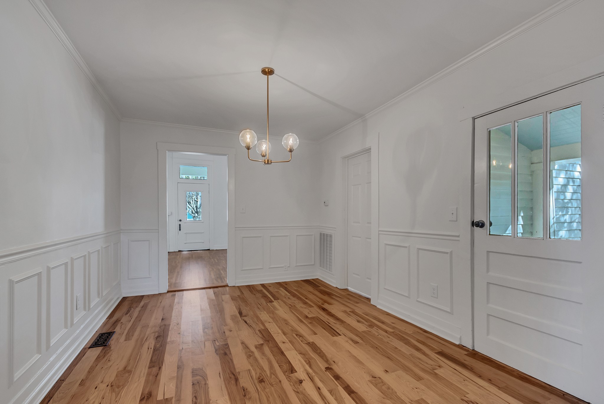 209 West 13th Street Columbia, TN 38401 - Photo 40 of 84 a view of empty room with wooden floor and fan