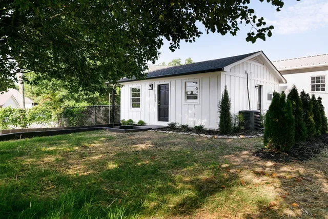 a view of a room with wooden walls