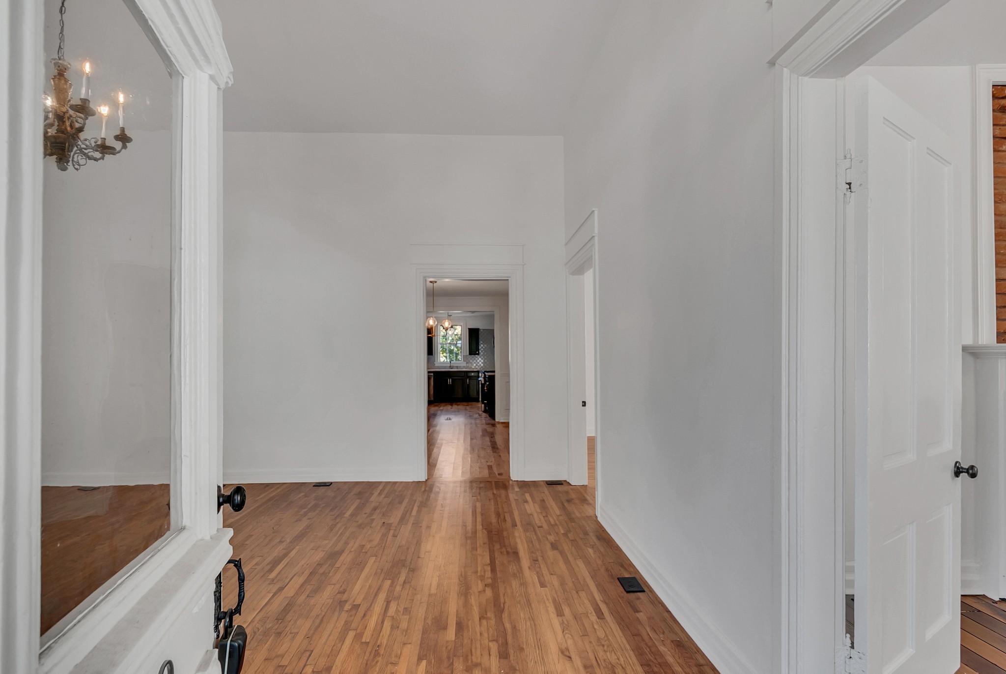 209 West 13th Street Columbia, TN 38401 - Photo 46 of 84 a view of a room with wooden floor and staircase