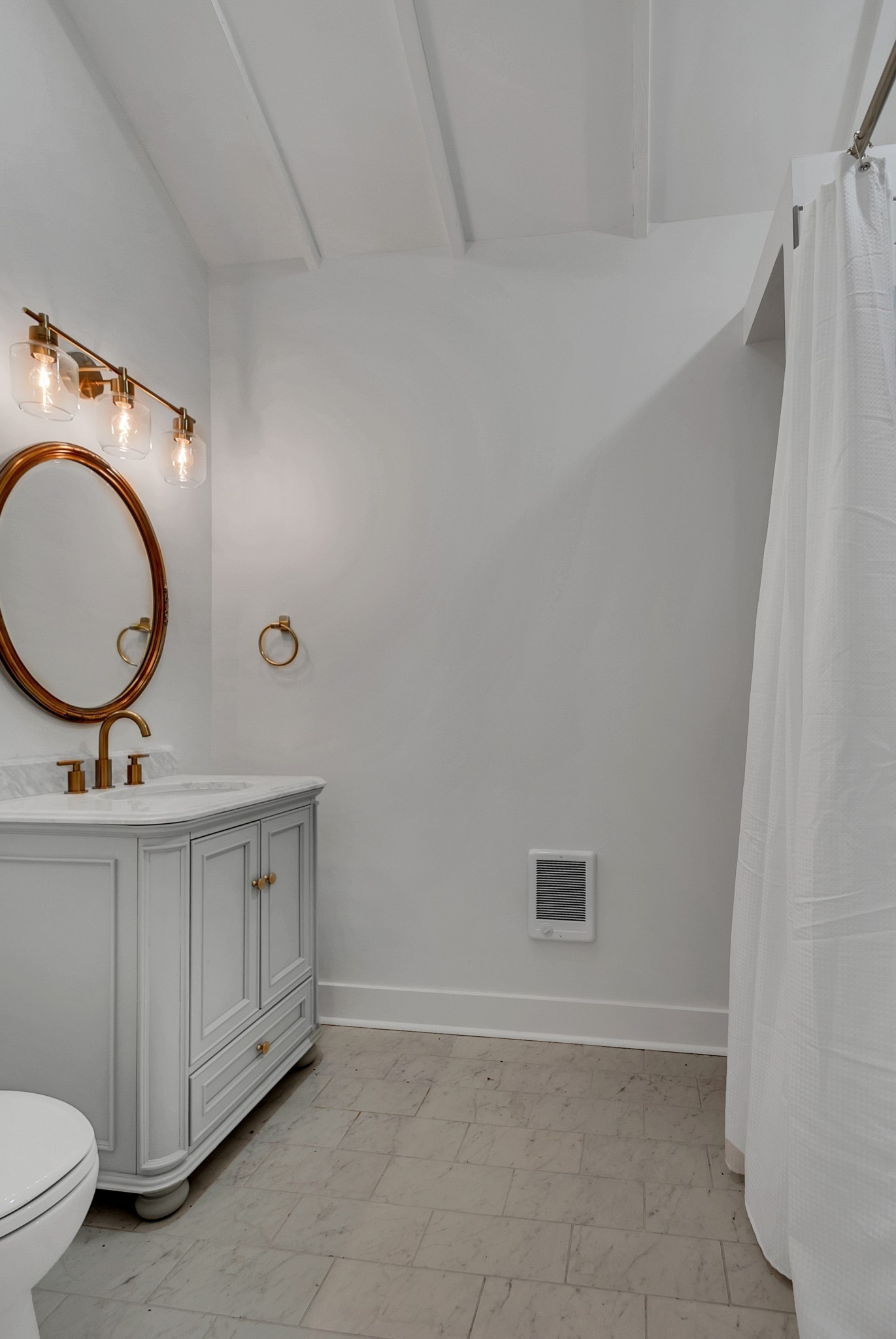 209 West 13th Street Columbia, TN 38401 - Photo 48 of 84 a bathroom with a sink a toilet and a mirror