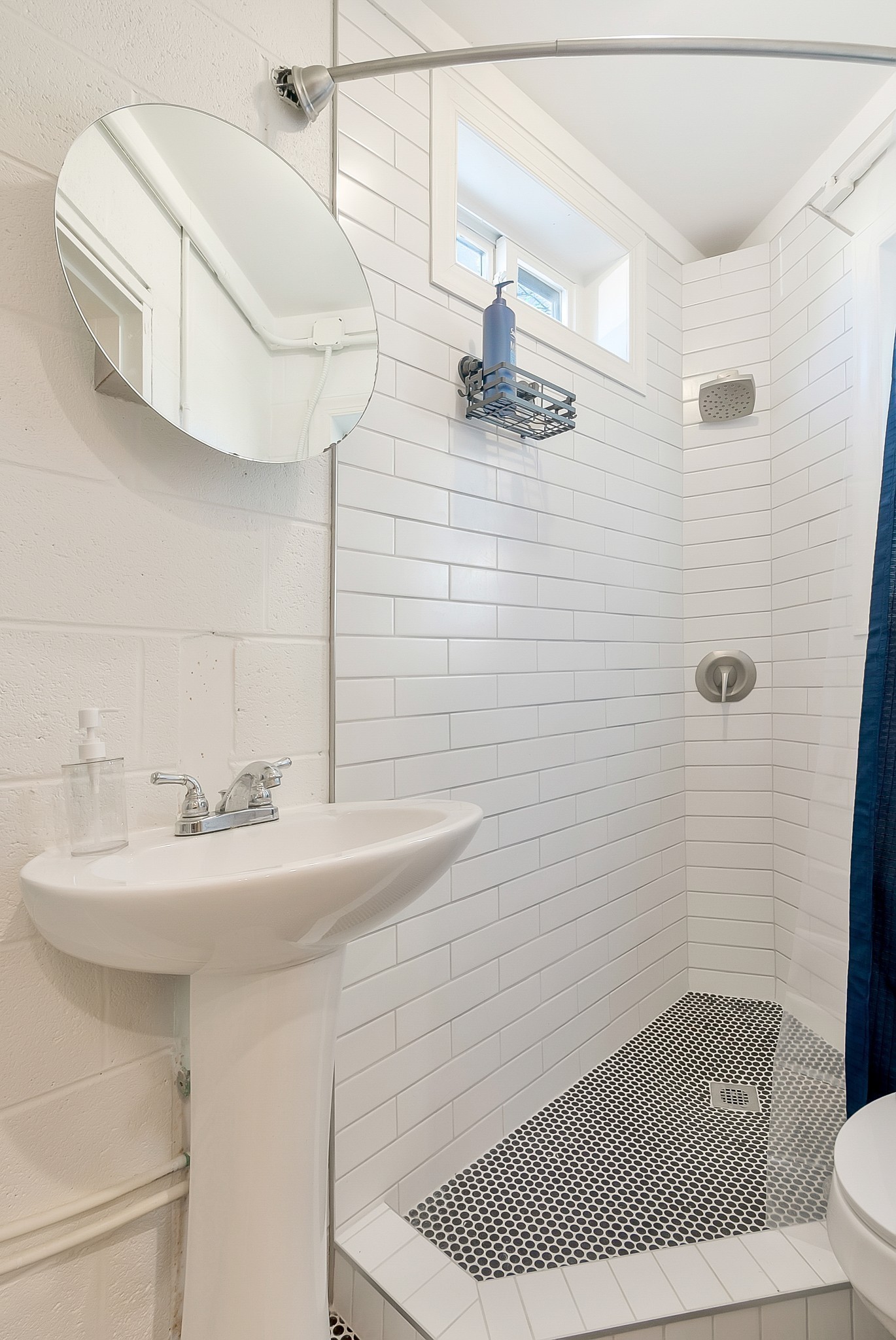 209 West 13th Street Columbia, TN 38401 - Photo 81 of 84 a bathroom with a sink a toilet and shower