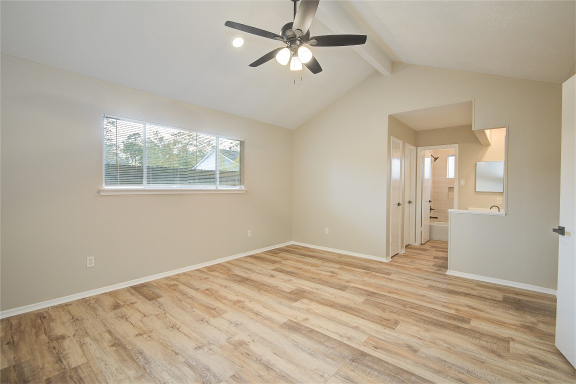 6722 Lynngate Drive Spring, TX 77373 - Photo 16 of 31 wooden floor in an empty room with a window