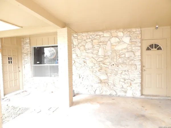 a view of a bathroom with a shower curtain