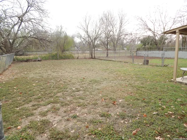 a view of outdoor space with deck and tree