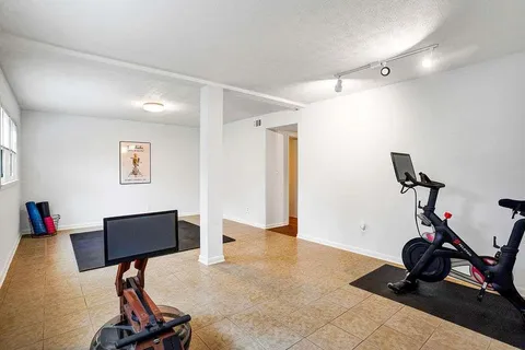 a view of a room with gym equipment