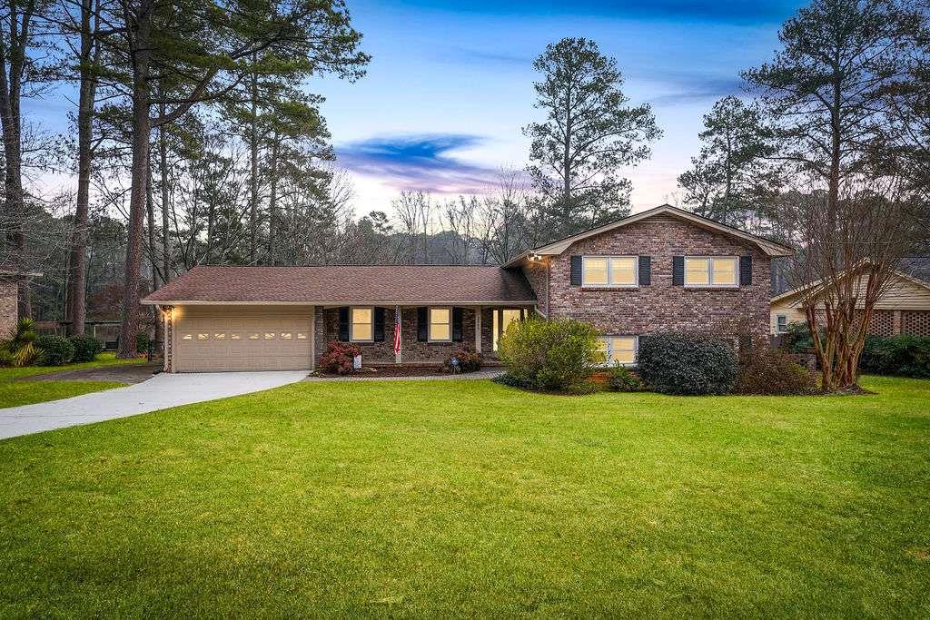 2889 Rotherwood Drive Tucker, GA 30084 - Photo 49 of 49 a front view of a house with yard and green space