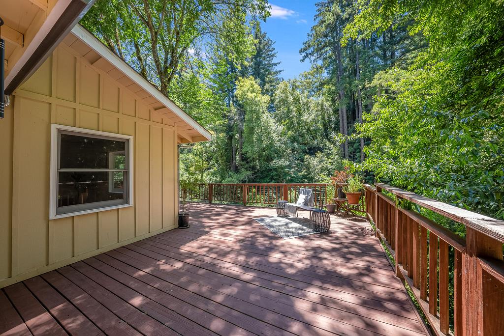 168 Riverside Drive Boulder Creek, CA 95006 - Photo 16 of 52 a view of backyard with deck and outdoor seating