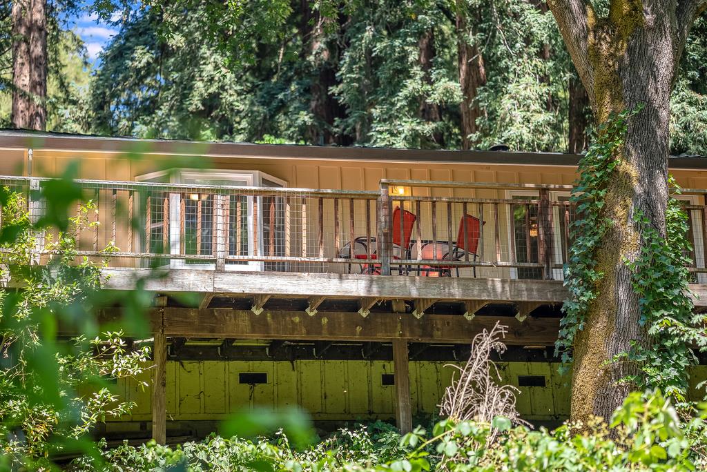 168 Riverside Drive Boulder Creek, CA 95006 - Photo 48 of 52 front view of a house with a lake view