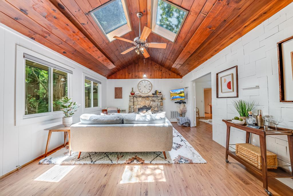 168 Riverside Drive Boulder Creek, CA 95006 - Photo 6 of 52 a living room with furniture appliances and a large window