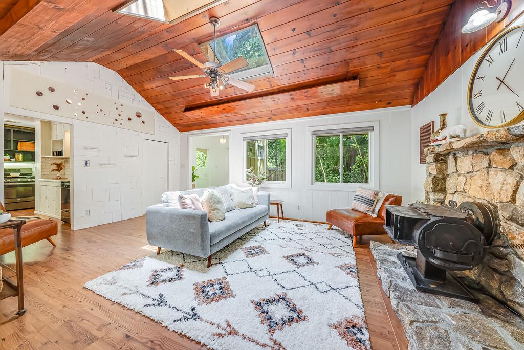 168 Riverside Drive Boulder Creek, CA 95006 - Photo 8 of 52 a living room with furniture and wooden floor