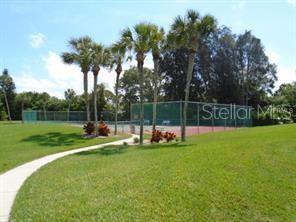 1648 Stickney Point Road, Unit 48202 Sarasota, FL 34231 - Photo 17 of 18 a view of a park with slide