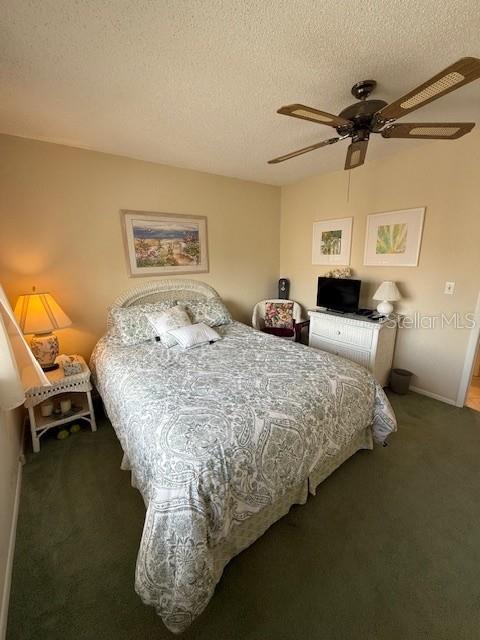 1648 Stickney Point Road, Unit 48202 Sarasota, FL 34231 - Photo 10 of 18 a bedroom with bed and window
