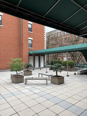a view of house with outdoor seating