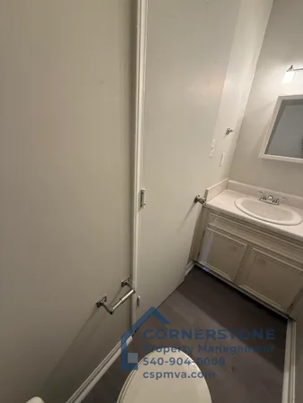 a bathroom with a sink and a toilet