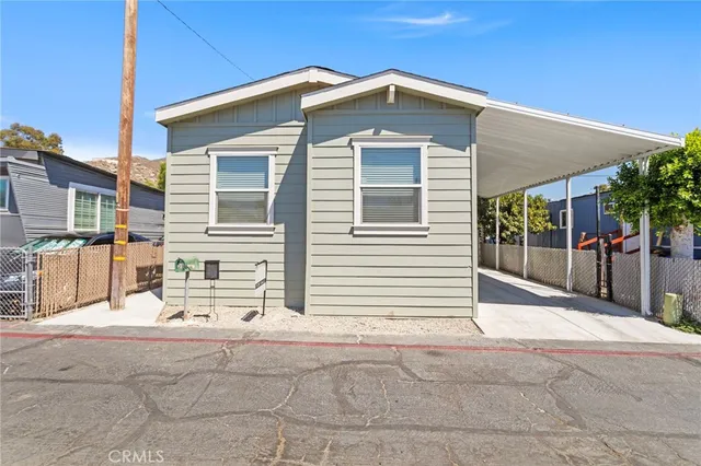 a front view of a house with a garage