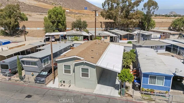 a view of a white building with many windows