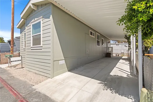 a view of a kitchen with a sink and a window