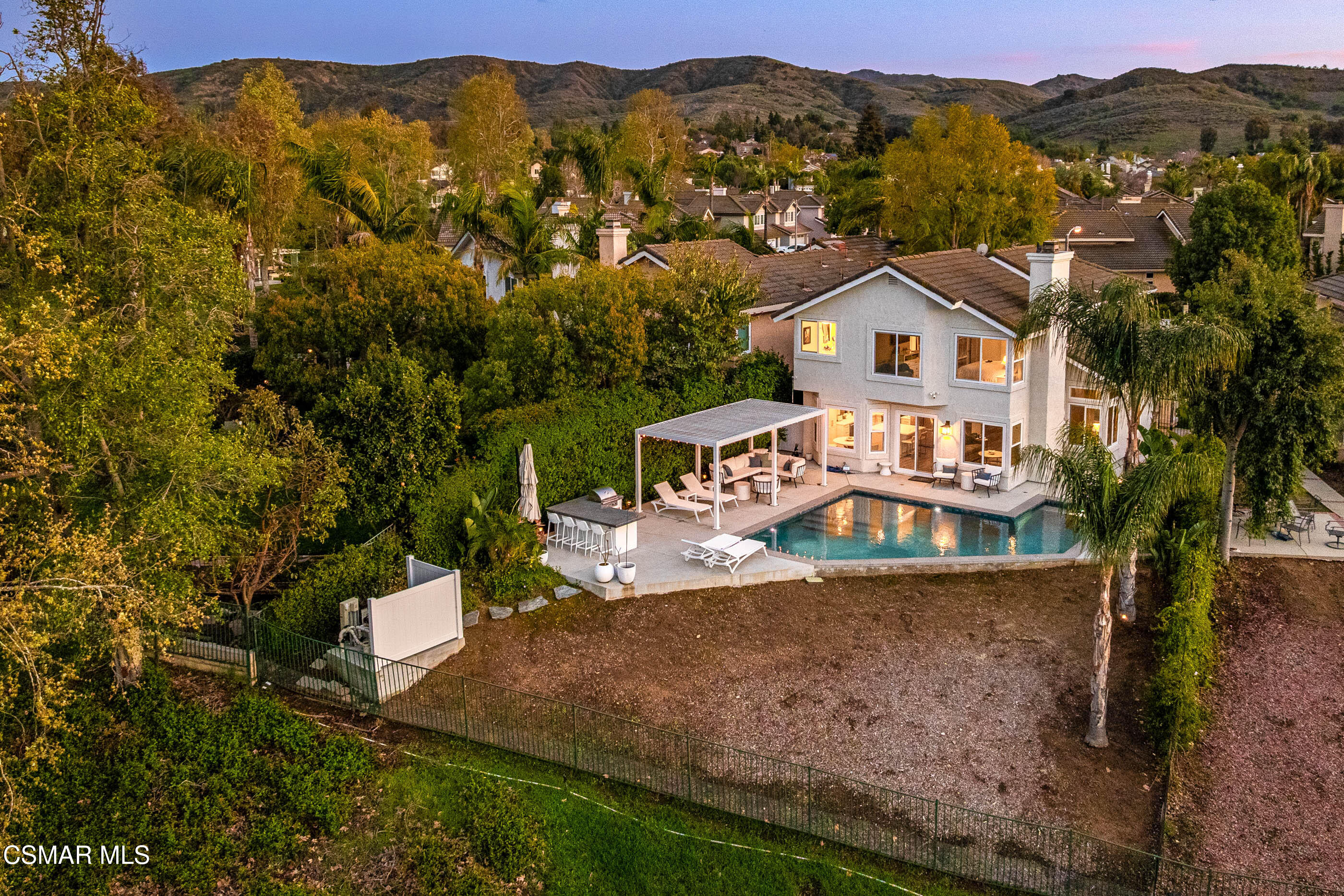 575 Fairfield Road Simi Valley, CA 93065 - Photo 1 of 57 an aerial view of a house with a yard