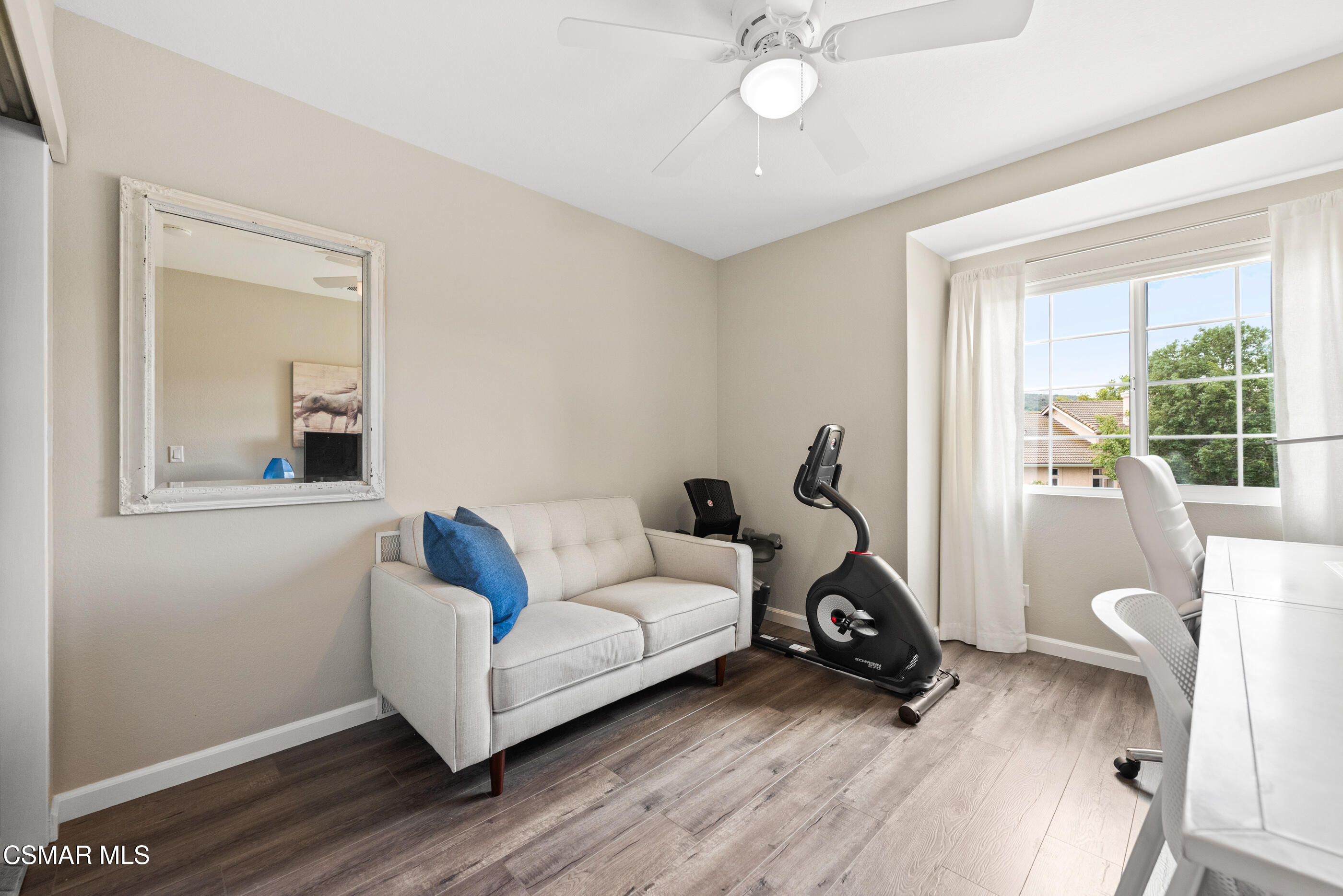 575 Fairfield Road Simi Valley, CA 93065 - Photo 32 of 57 a living room with furniture and a wooden floor