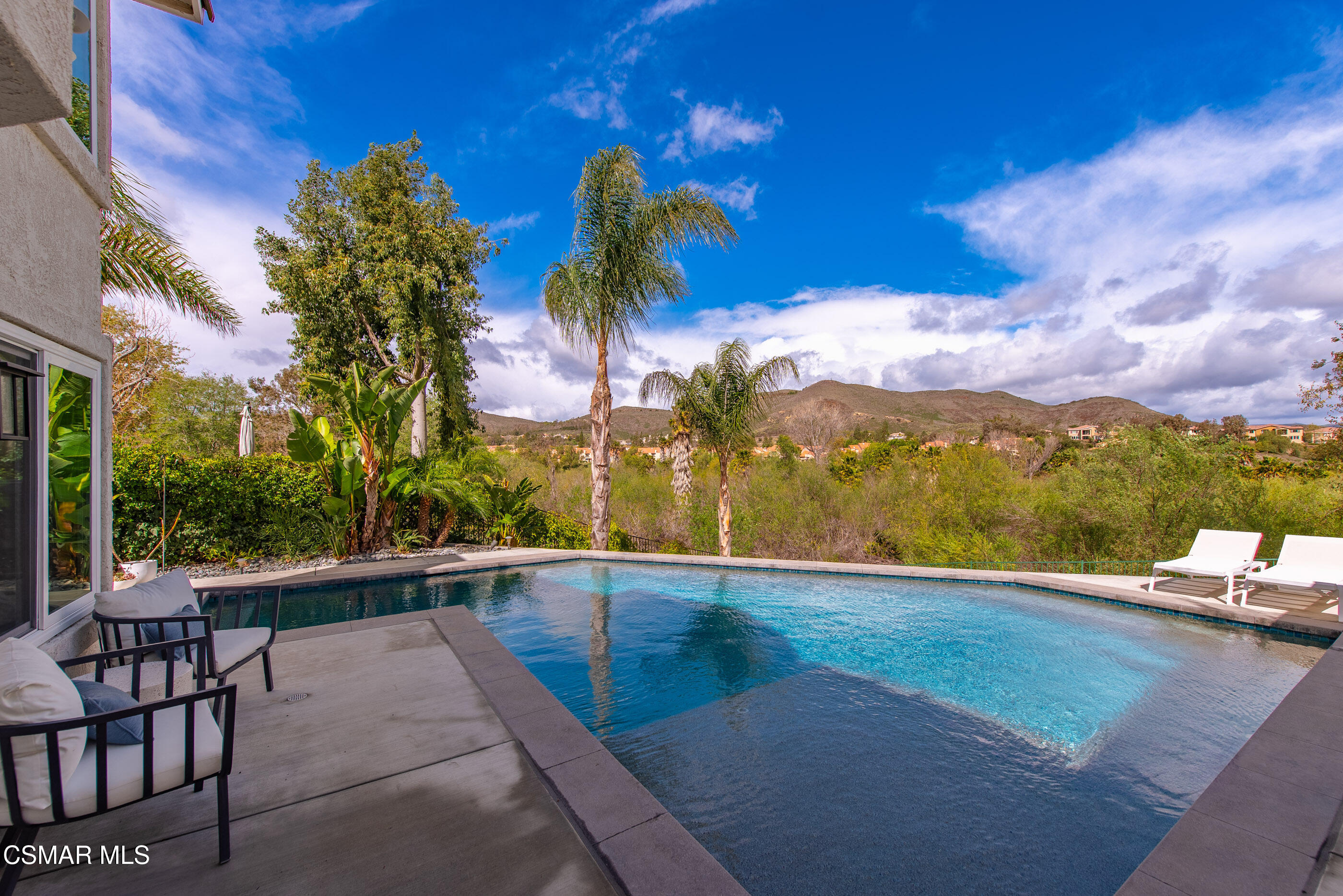 575 Fairfield Road Simi Valley, CA 93065 - Photo 35 of 57 a view of swimming pool with an outdoor seating