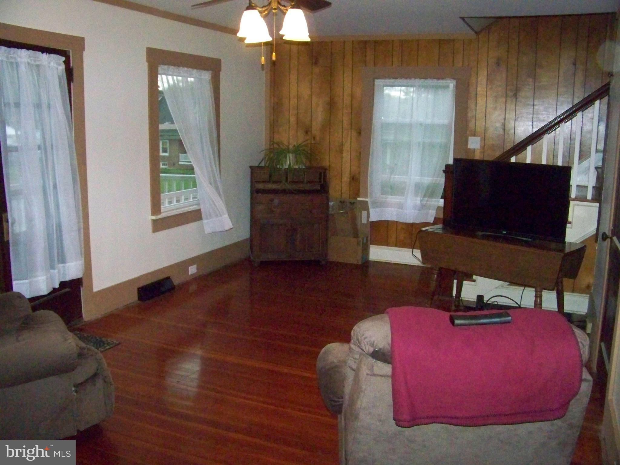362 Buck Road Quarryville, PA 17566 - Photo 12 of 21 a living room with furniture and a flat screen tv