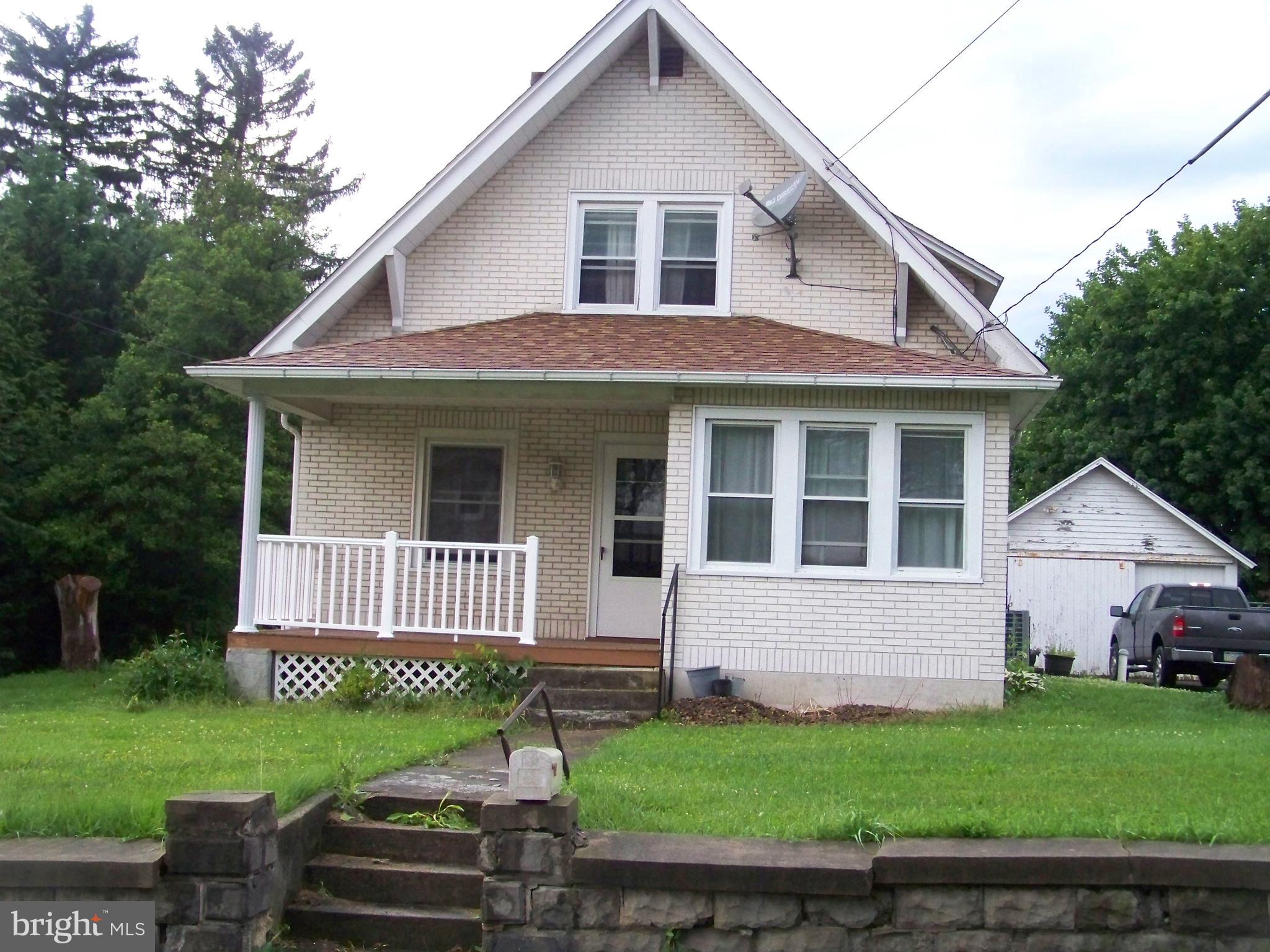 362 Buck Road Quarryville, PA 17566 - Photo 2 of 21 a front view of a house with a yard