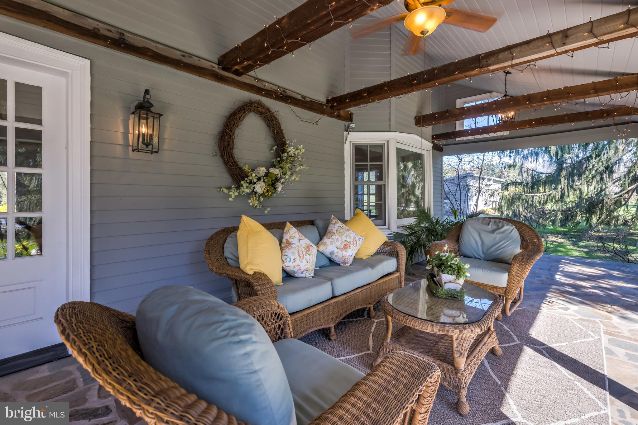 Covered front porch with original beams
